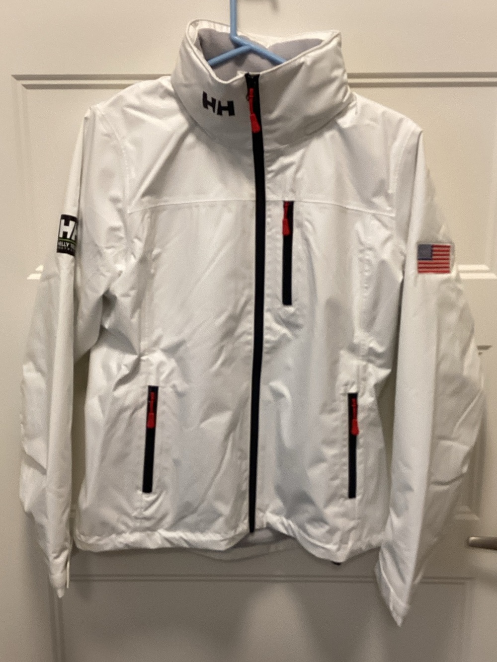 Helly Hansen Mid Layer, White Jacket with Black Trims and Red Zipper Accents